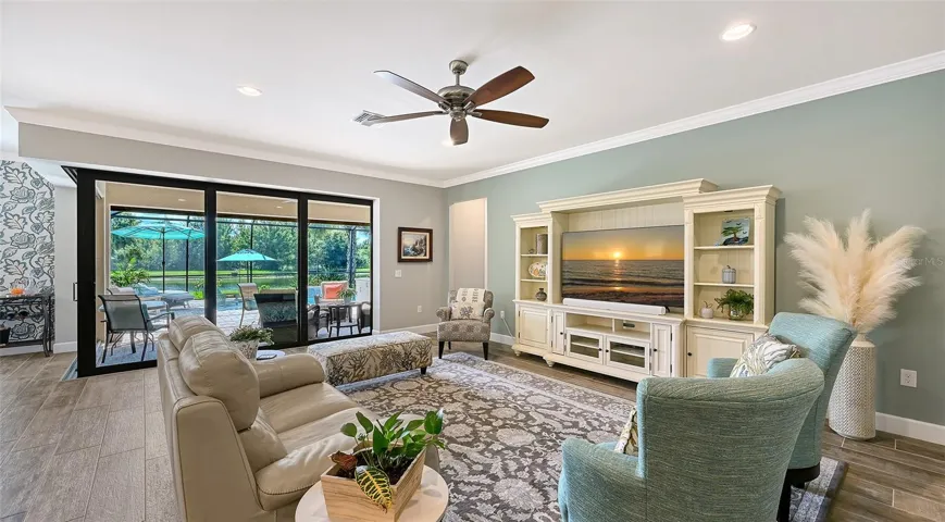 This inviting great room provides the perfect setting to unwind, relax, and enjoy the comfort of this exceptional home.