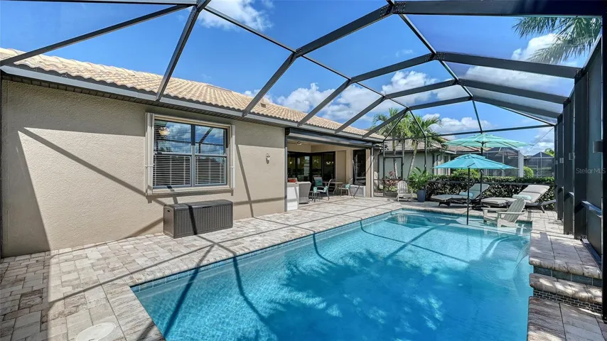 Enjoy leisurely afternoons lounging beneath the covered lanai.