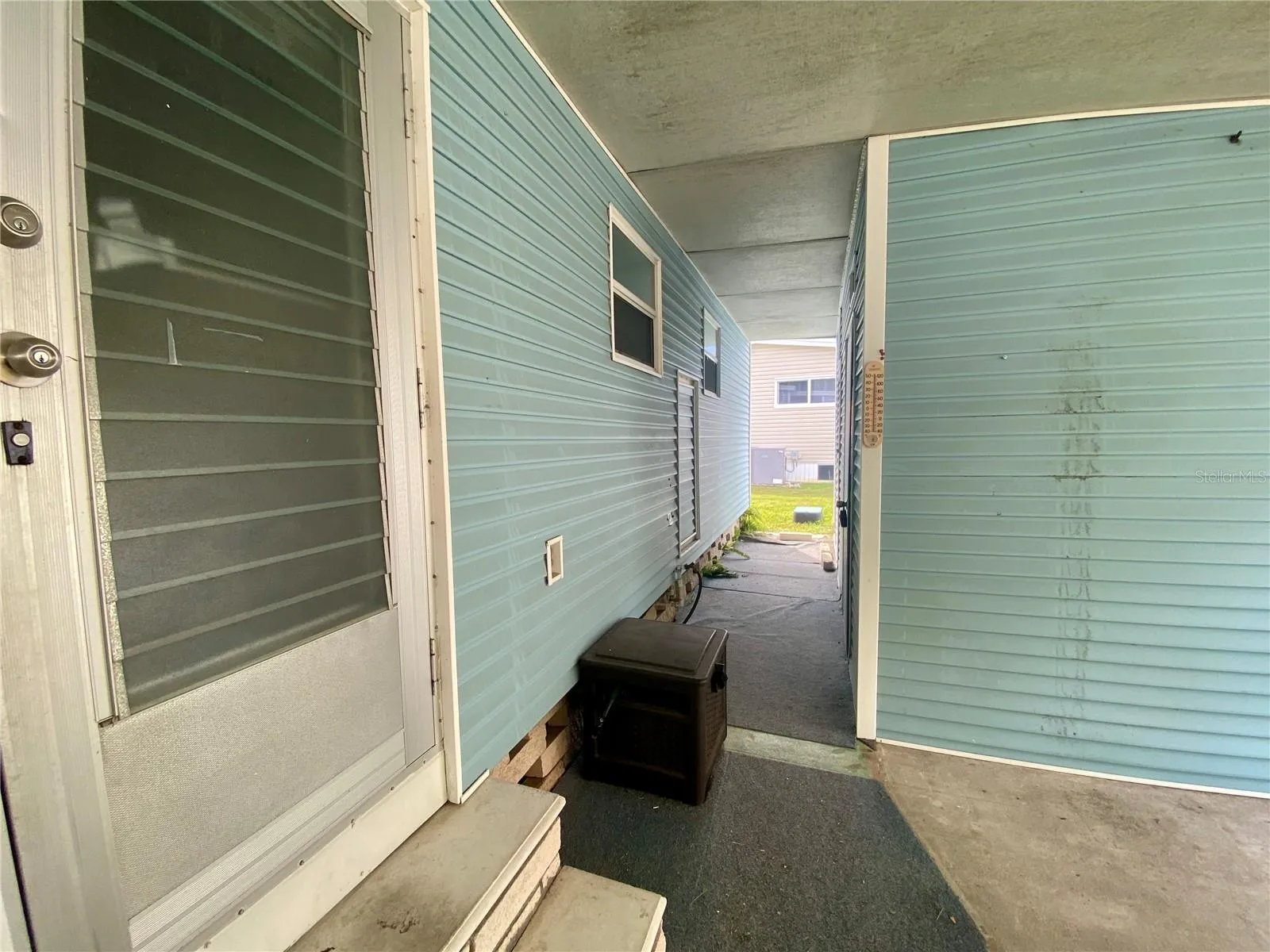 Breezeway to Laundry room and storage