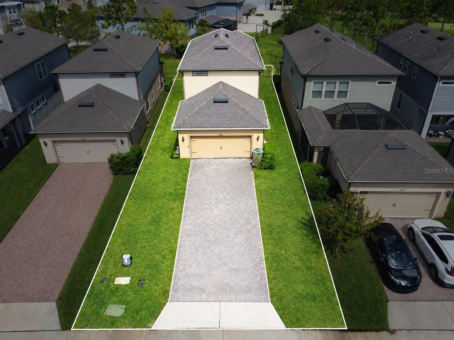 Property highlighted, approximate lot lines.