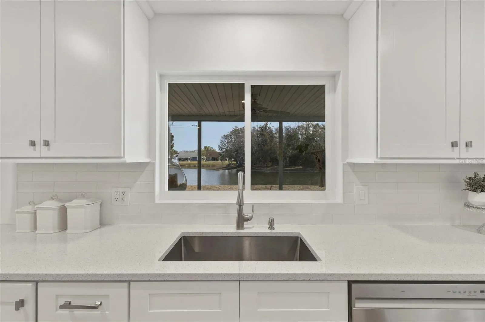 Watch the birds while doing dishes, pass through bar for patio
