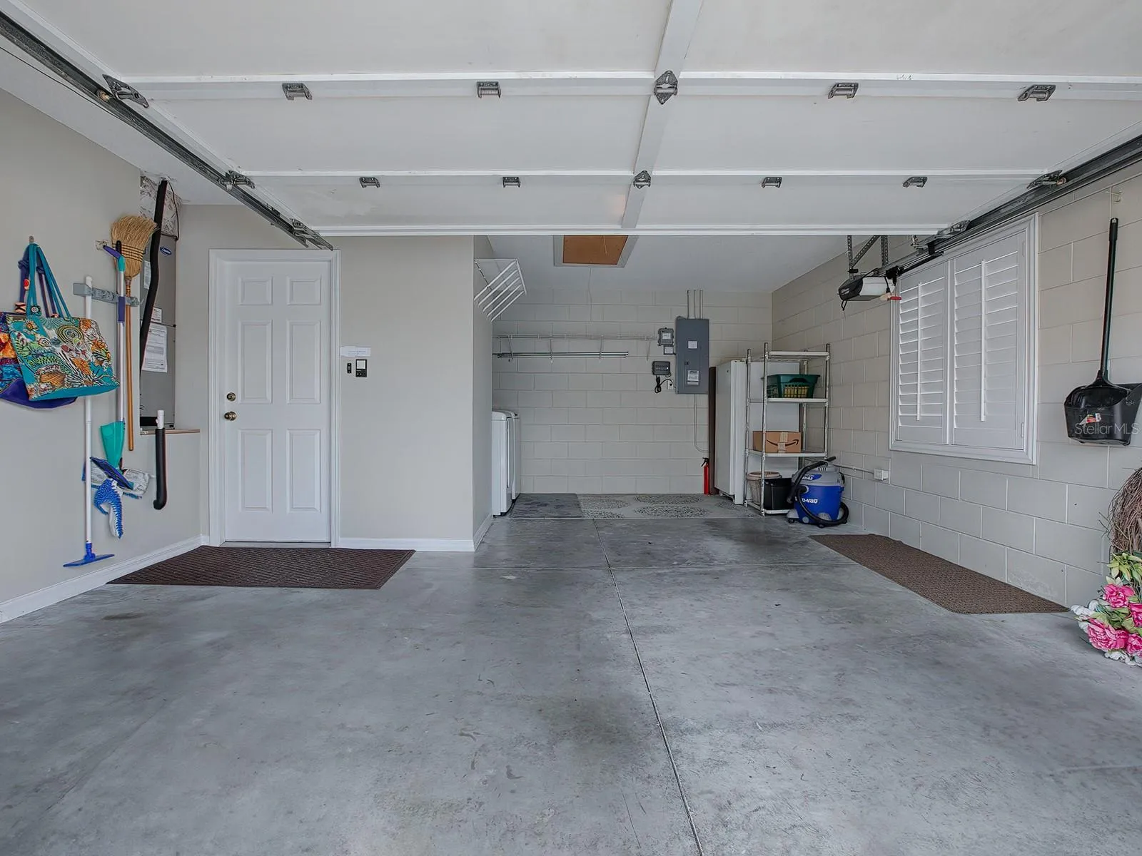Garage with enough room for one car and a golf cart