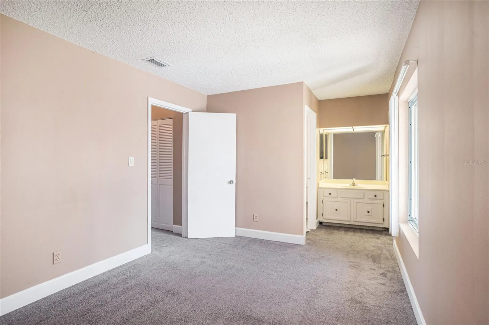 Each room has a private vanity. Carpet has been replaced with LVP