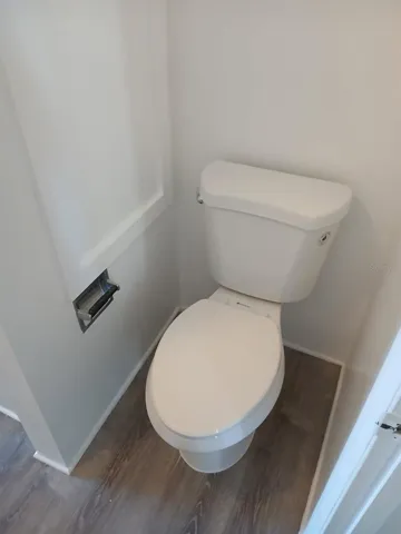 New toilet and upper-level flooring.