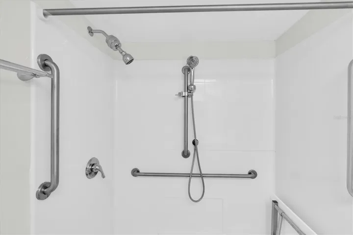 Ensuite Step-In Shower with Grab Bars and Seat.