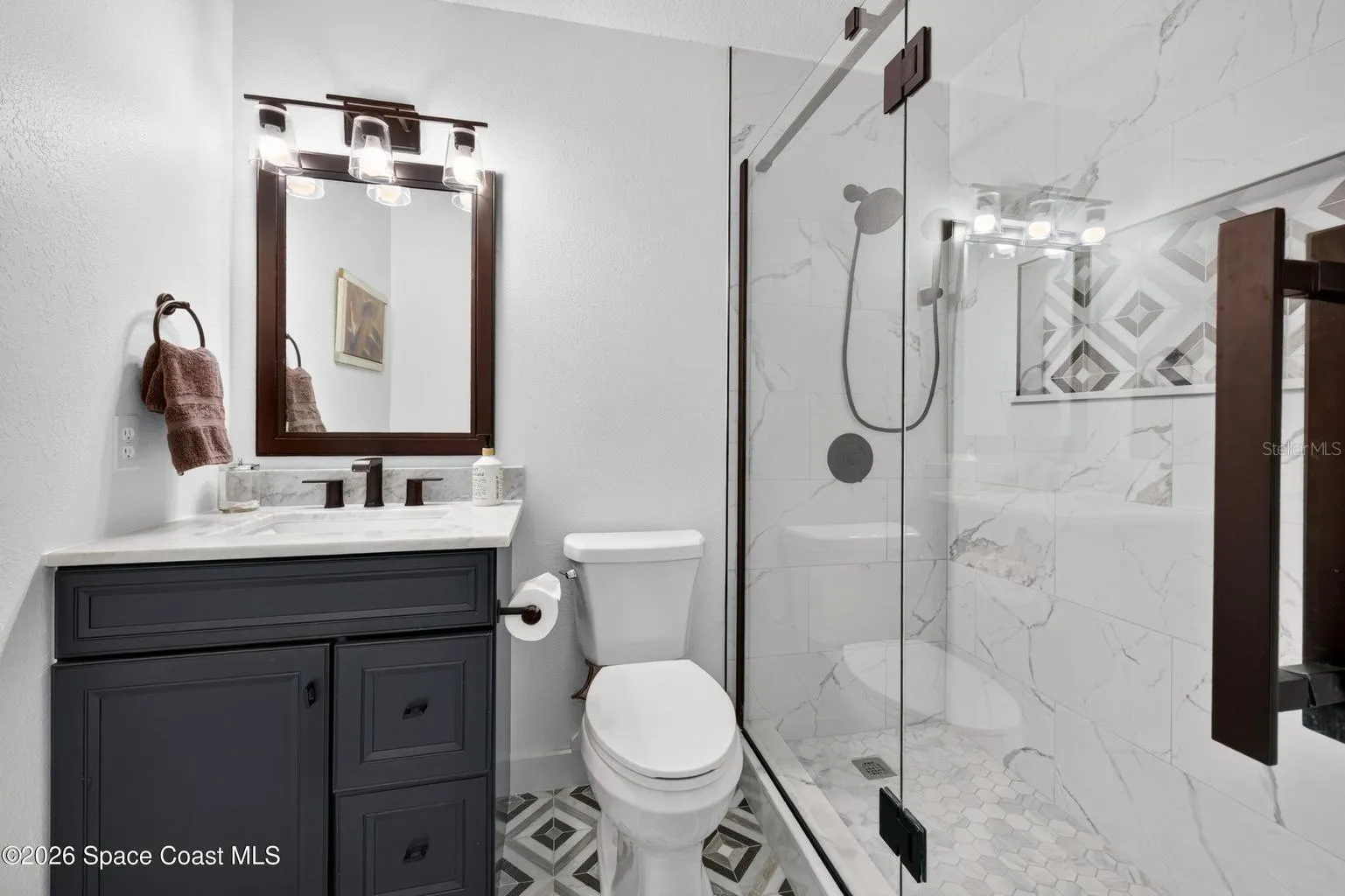 Updated bath with frameless shower