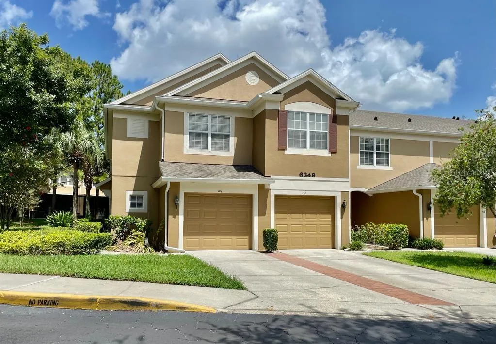Inviting townhome in gated Vistas at Stonebridge Commons.
