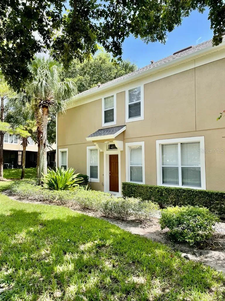 Well-maintained community surrounded by mature landscaping.