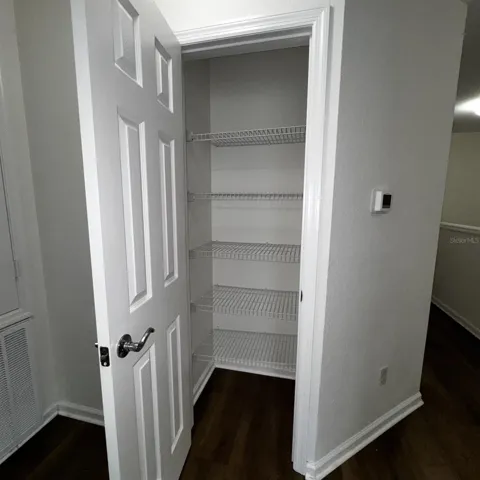 Additional storage with built-in shelving