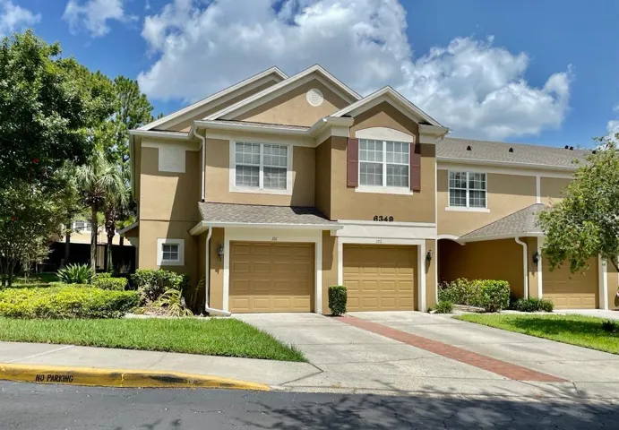 Inviting townhome in gated Vistas at Stonebridge Commons.