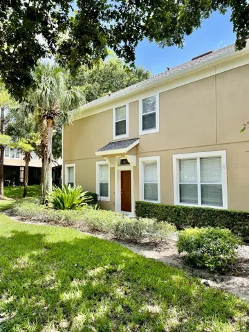 Well-maintained community surrounded by mature landscaping.