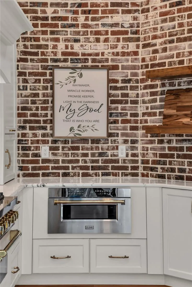 The chef's kitchen is a true focal point with a distinctive mix of old-world charm and modern design that combine luxury and function