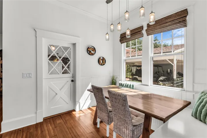 Bright and cozy breakfast nook with built-in seating