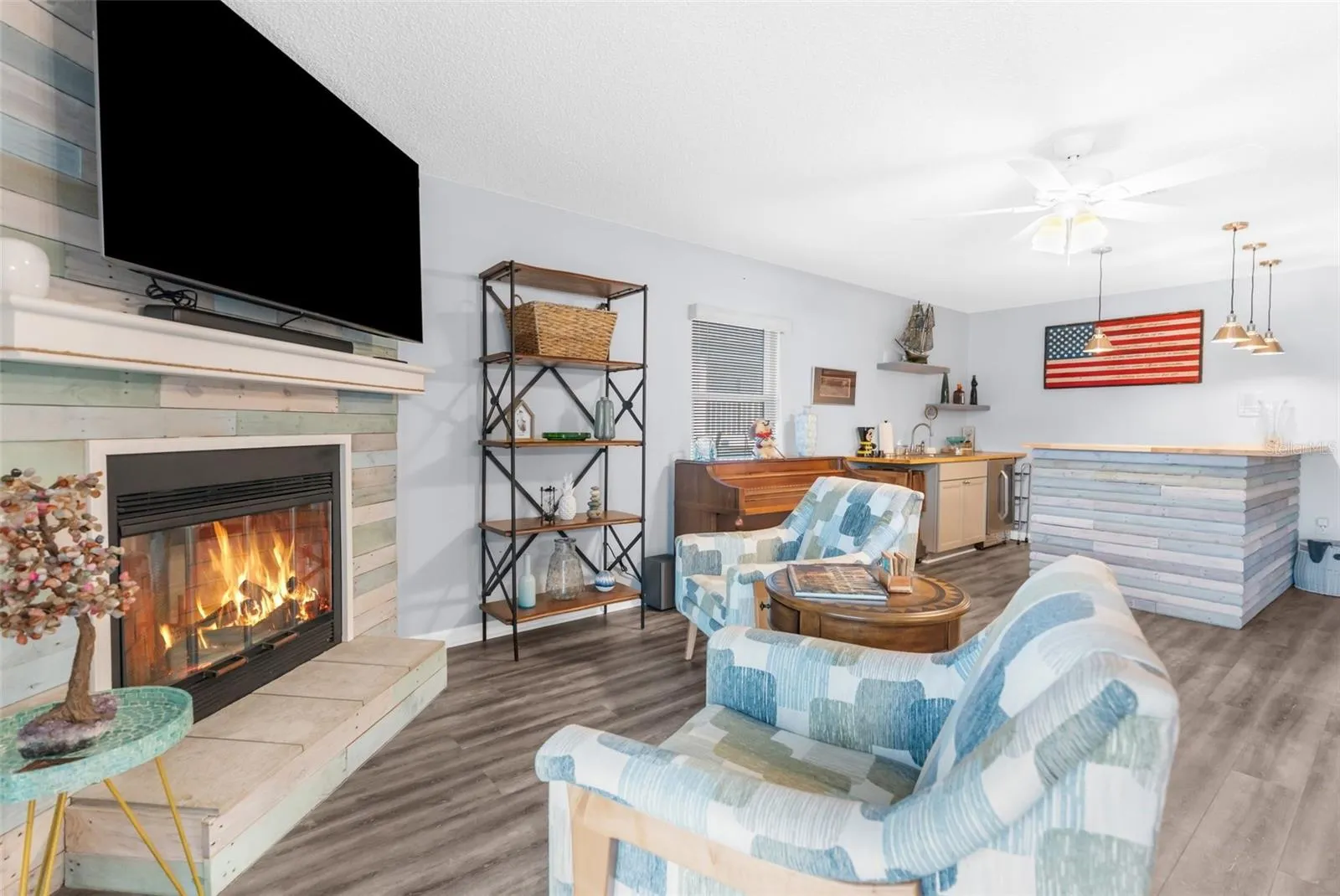 Living Room with Fireplace - Could be in Law Suite with separate entrance attached to home. Located on first floor.