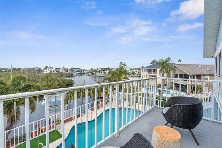 Back exposure deck off Owners Suite. Located on second story.