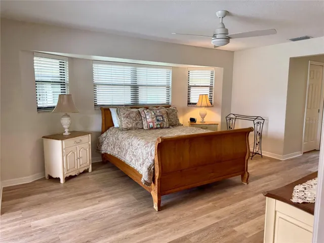 Primary bedroom with bay windows