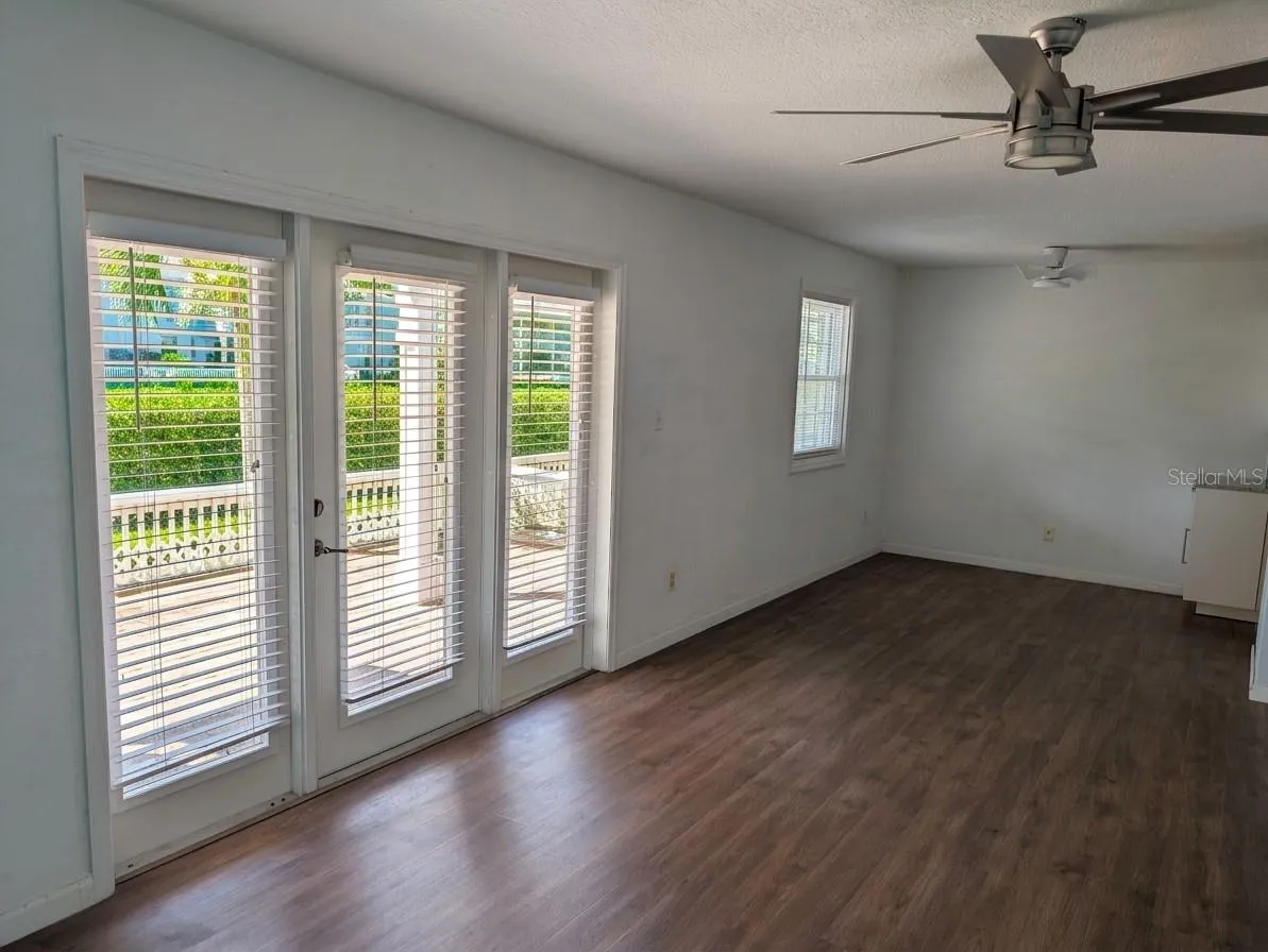LIVING AREA WITH VIEW OUT TO THE PATIO