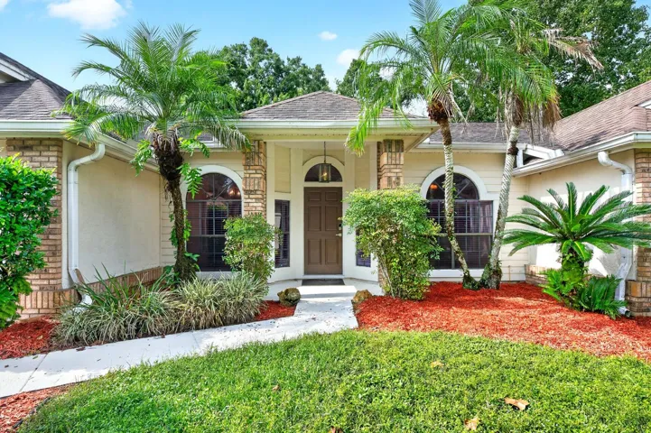Situated on a large, beautifully landscaped lot in a QUIET CUL-DE-SAC, this 4-Bedroom, 2-Bath single-story home provides a wonderful combination of comfort, style and Florida outdoor living.