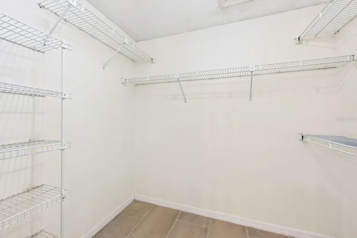 The Primary walk-in closet provides generous storage.