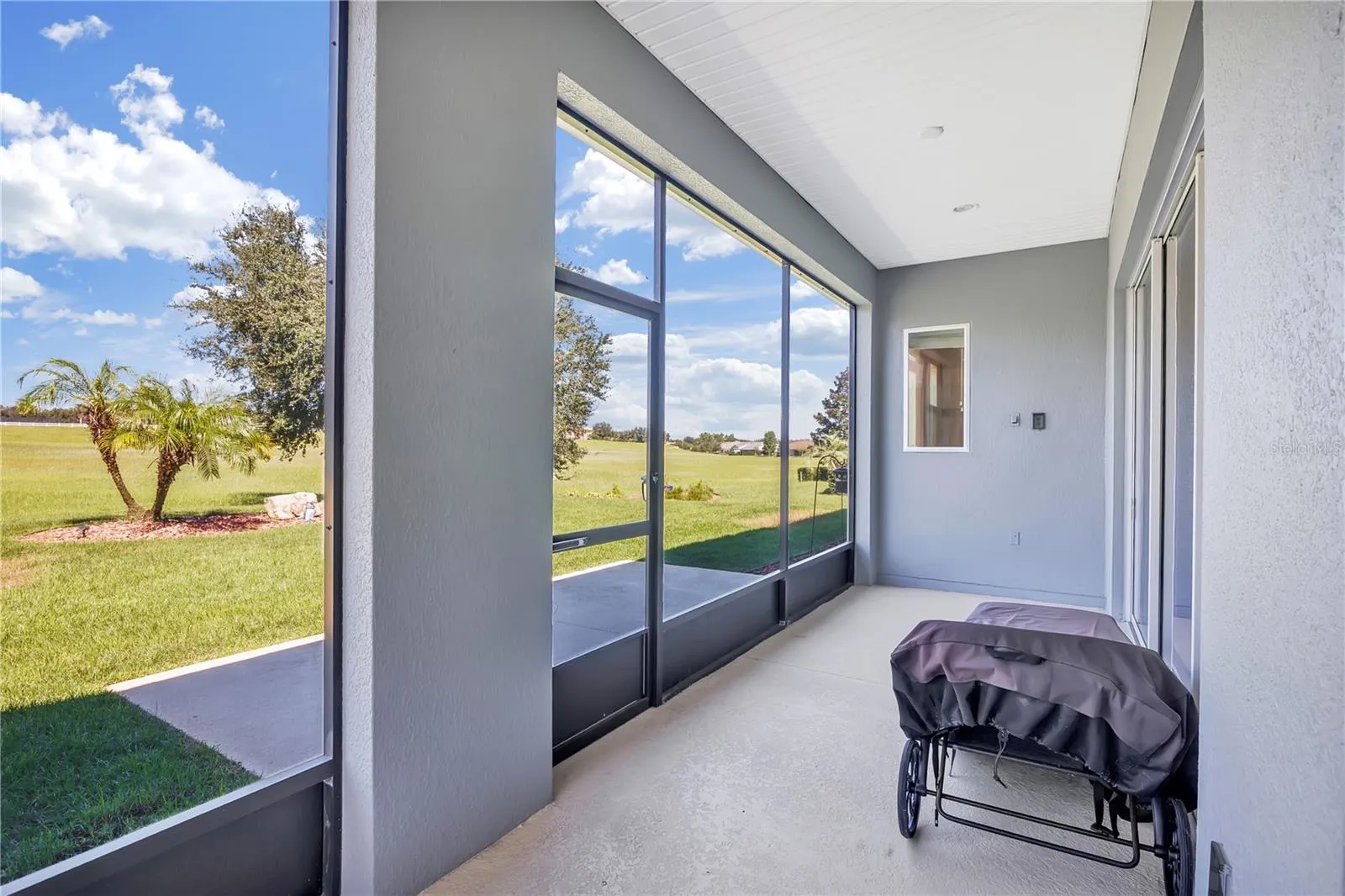 Covered and Screened Porch off Primary Bedroom