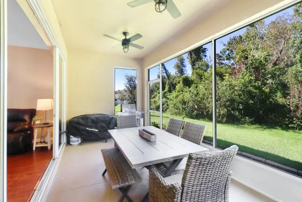 Screened rear porch with view to conservation area