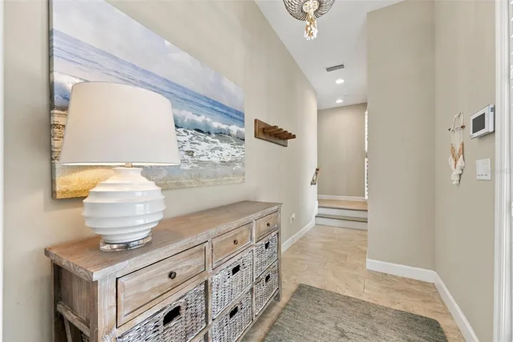 Welcome through the front entry, with convenient access to the second level by either stairs or elevator.