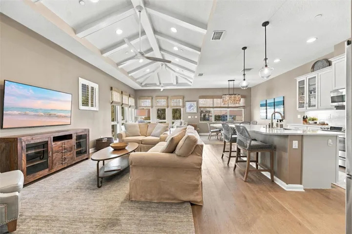 Turnkey-furnished 2-bedroom, 2-bath Bermuda coach home featuring a versatile bonus room—perfect for a den, home office, or additional bedroom!