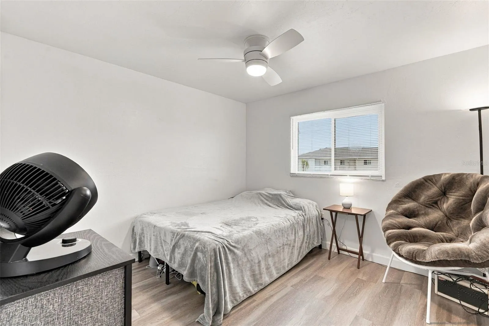 Light and Airy Second Bedroom with Ceiling Fan