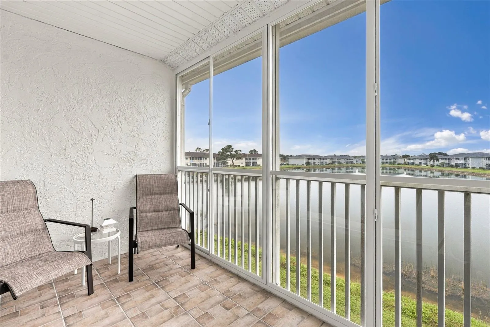 Breathtaking Panoramic Lake Views from Expansive Screened Lanai