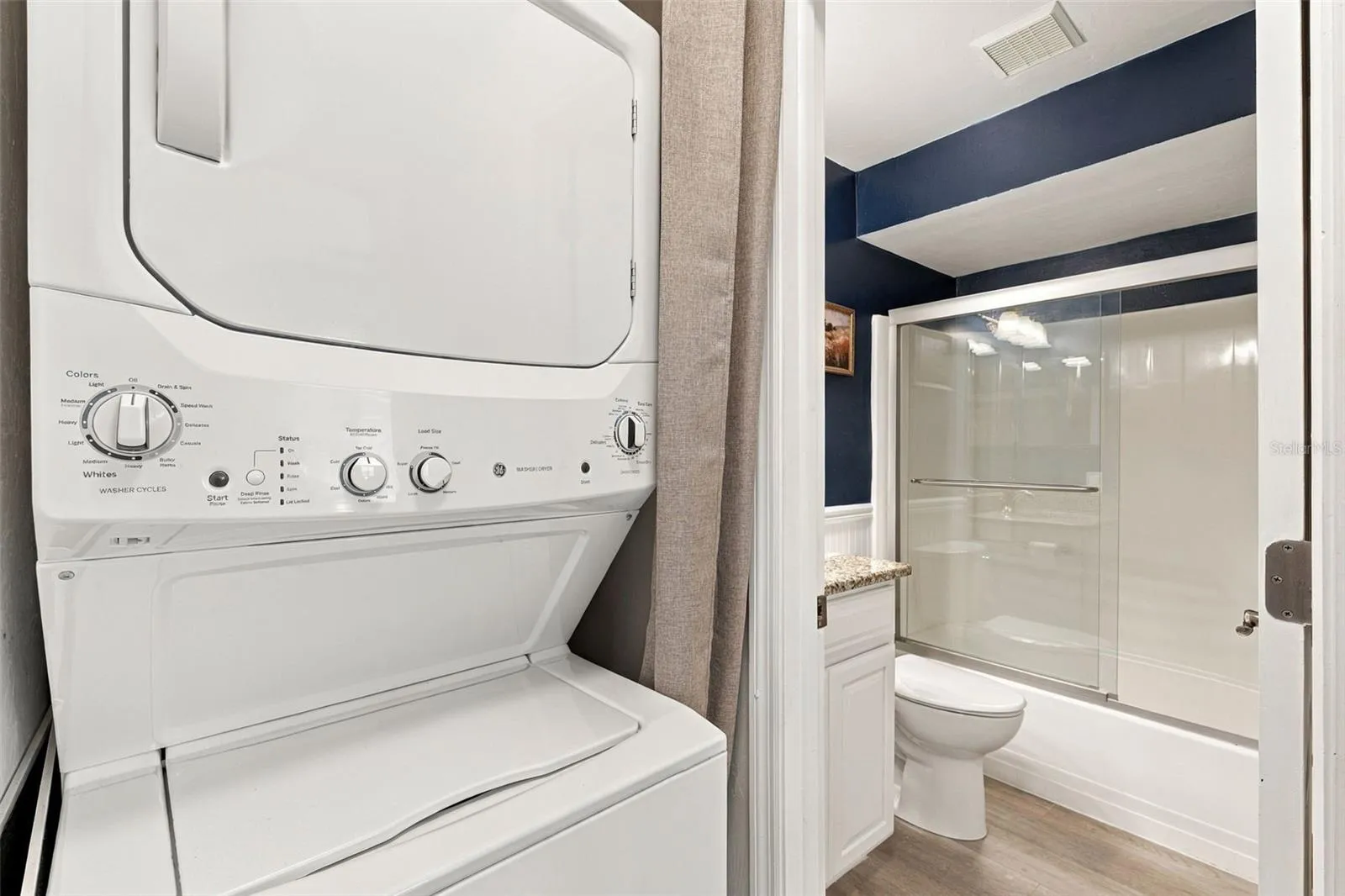Convenient Indoor Laundry Featuring Stacked Washer and Dryer
