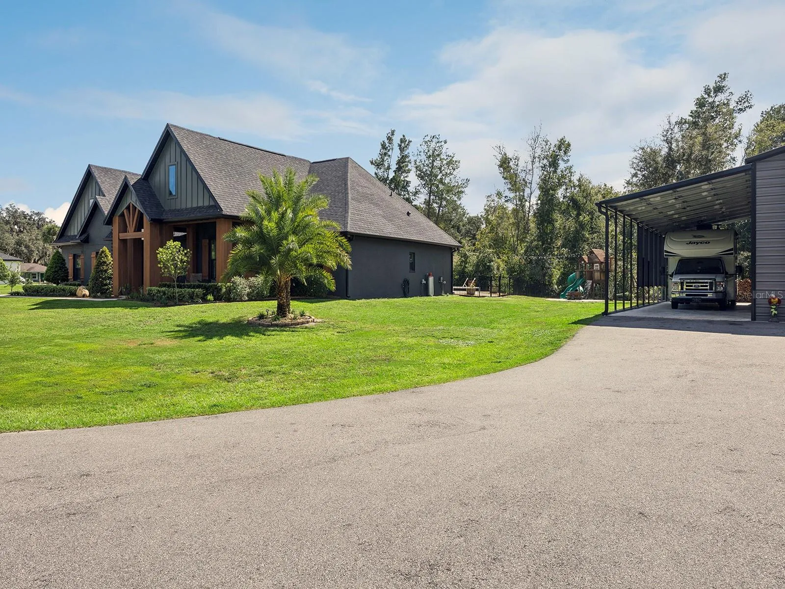Exterior of home and RV carport