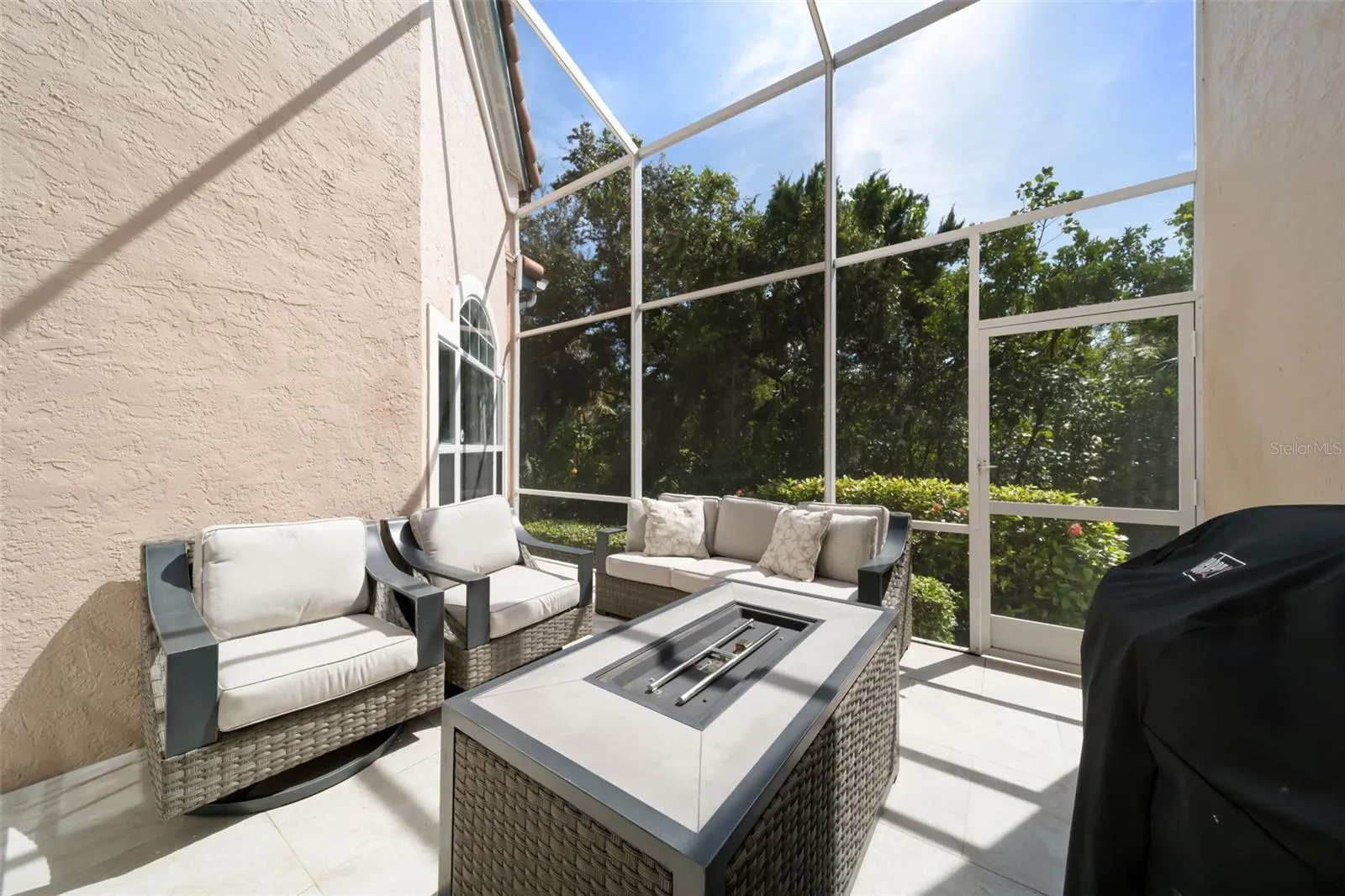 Screened in Patio with Fire Pit