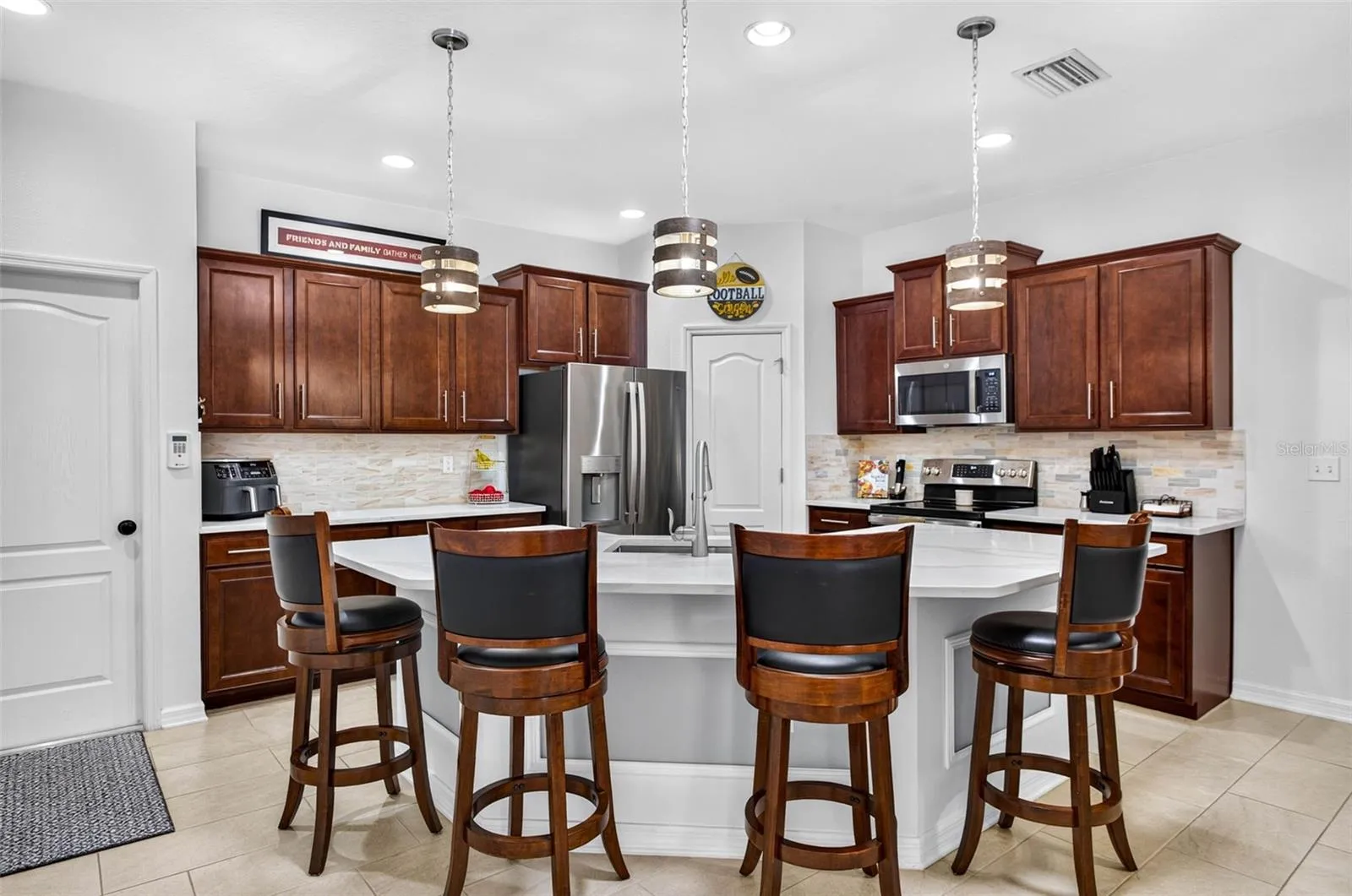 Or sit at the island with upgraded countertops.