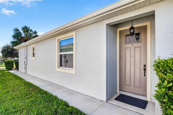 Side entry or enter via the garage.