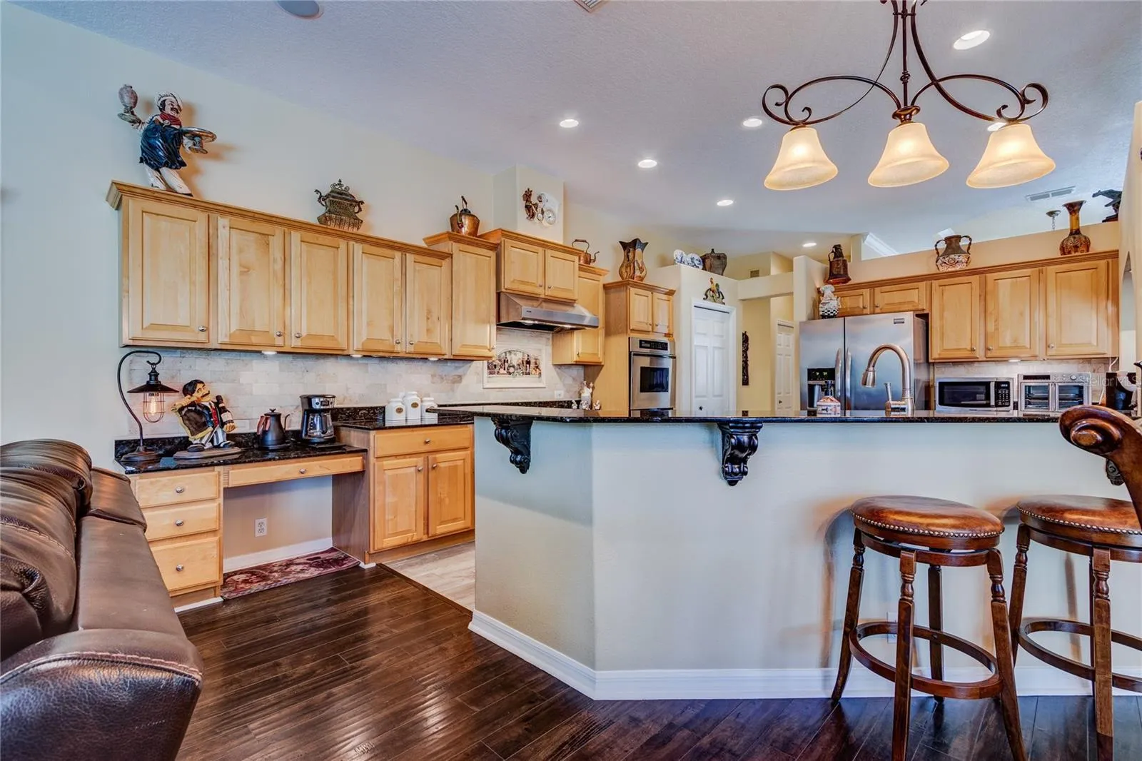 Kitchen with wood cabinets and higher end appliances