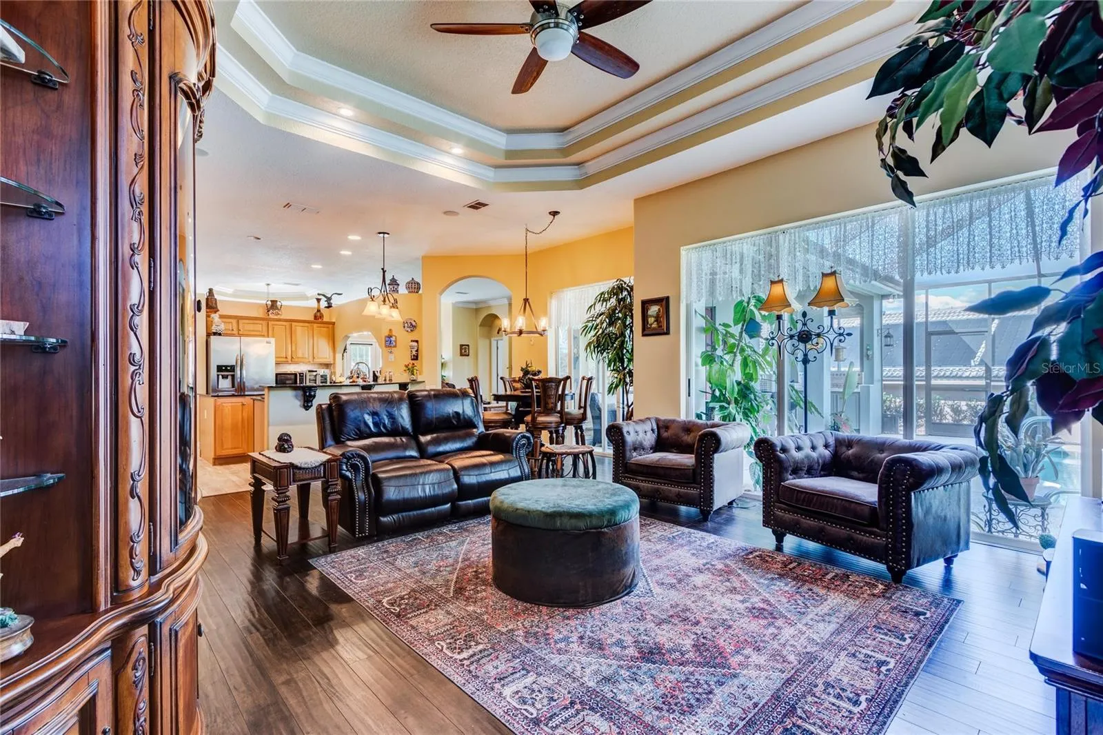 Great room is OPEN to the kitchen with sliding doors to the Lanai boasting Expansive Golf Course views