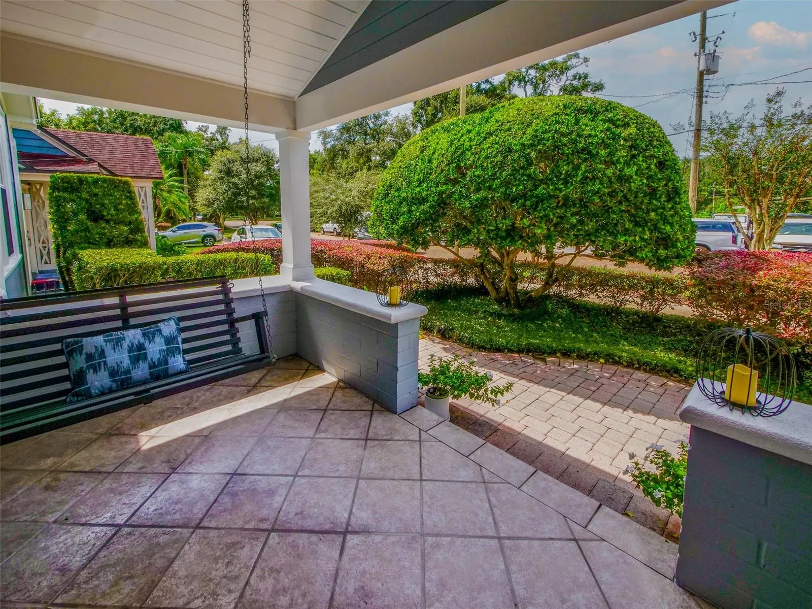 View from the covered front porch with porch swing