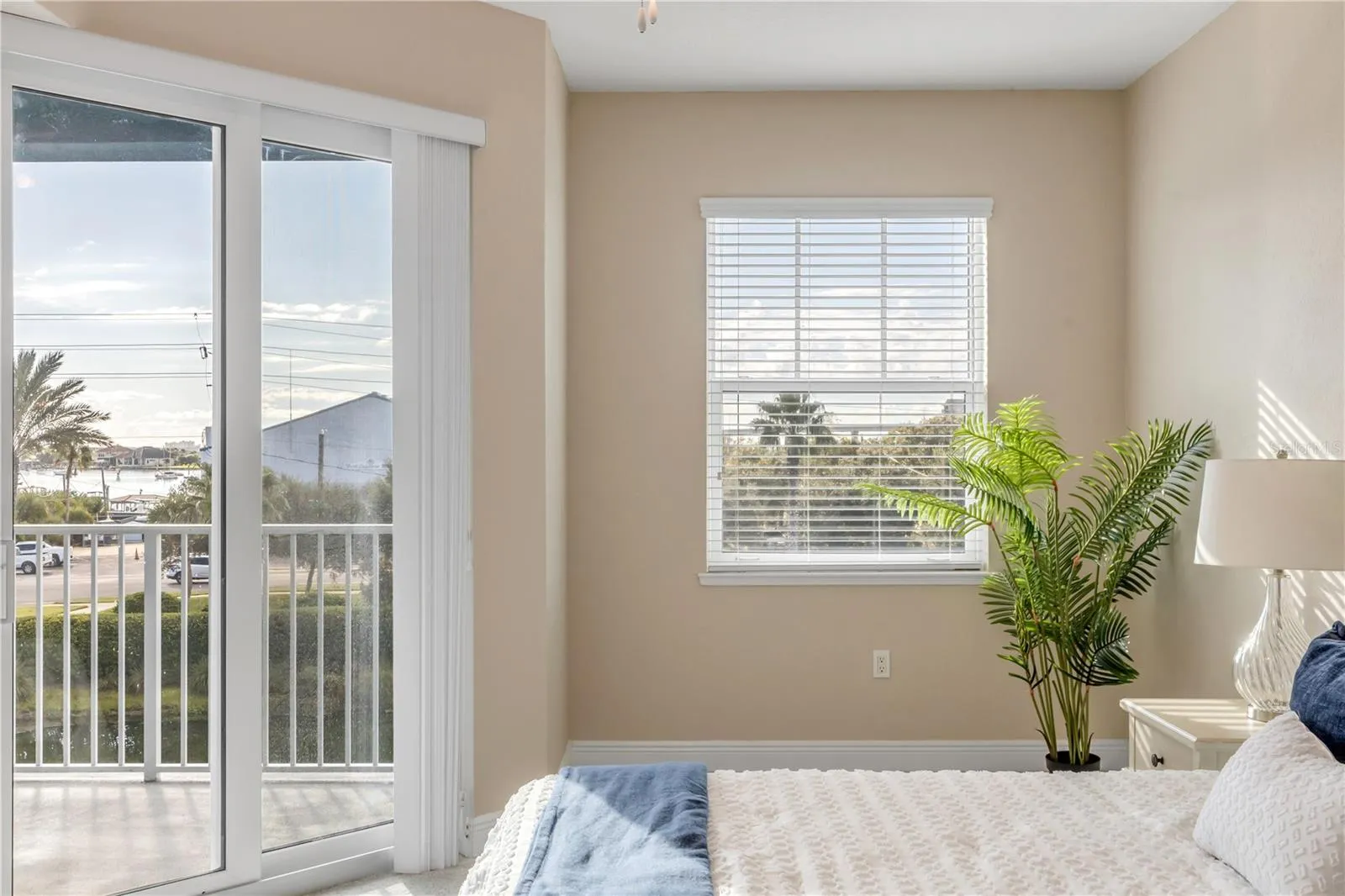 Primary Bedroom with slider to the back patio