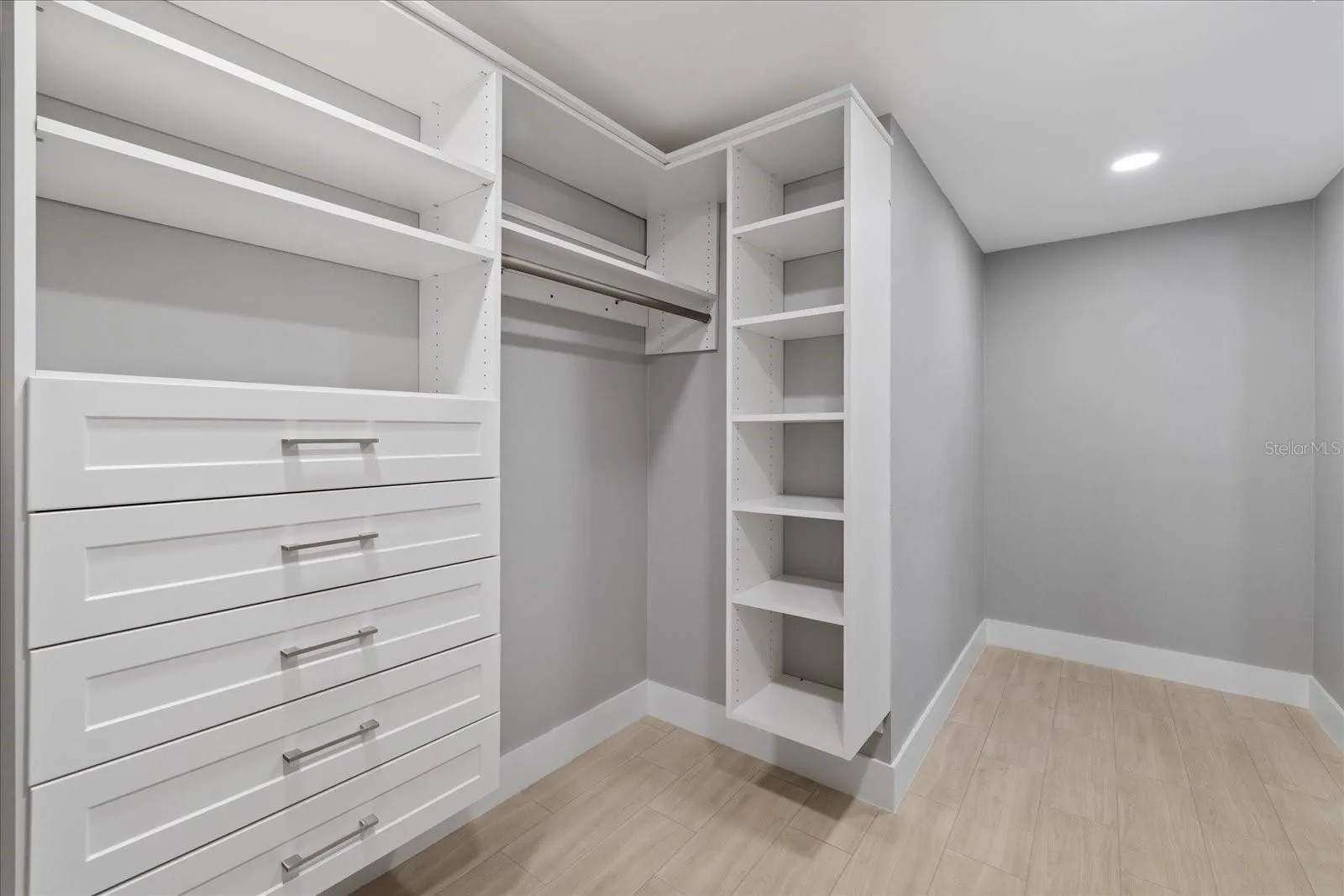 Walk in custom closet in primary