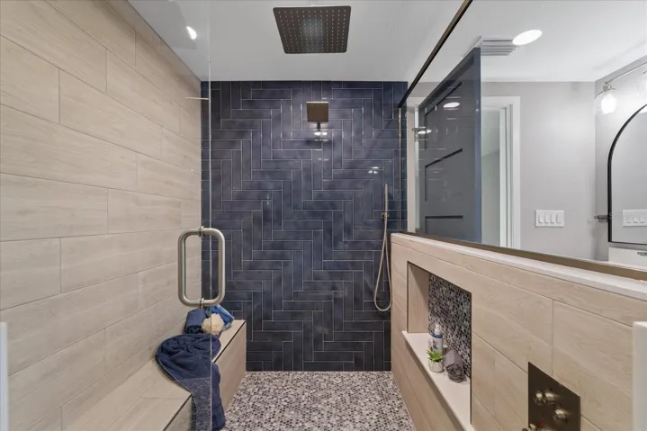 Large walk in glass shower in primar