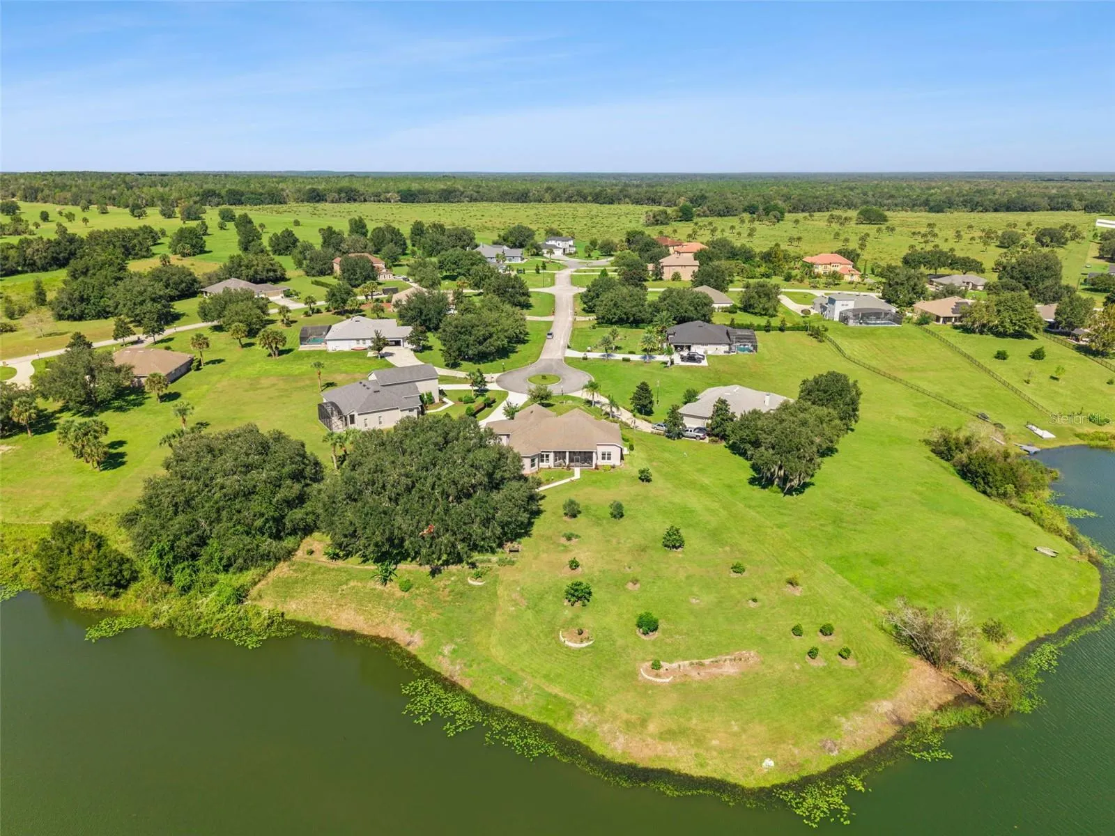 Located at the end of the cul de sac with direct water front location