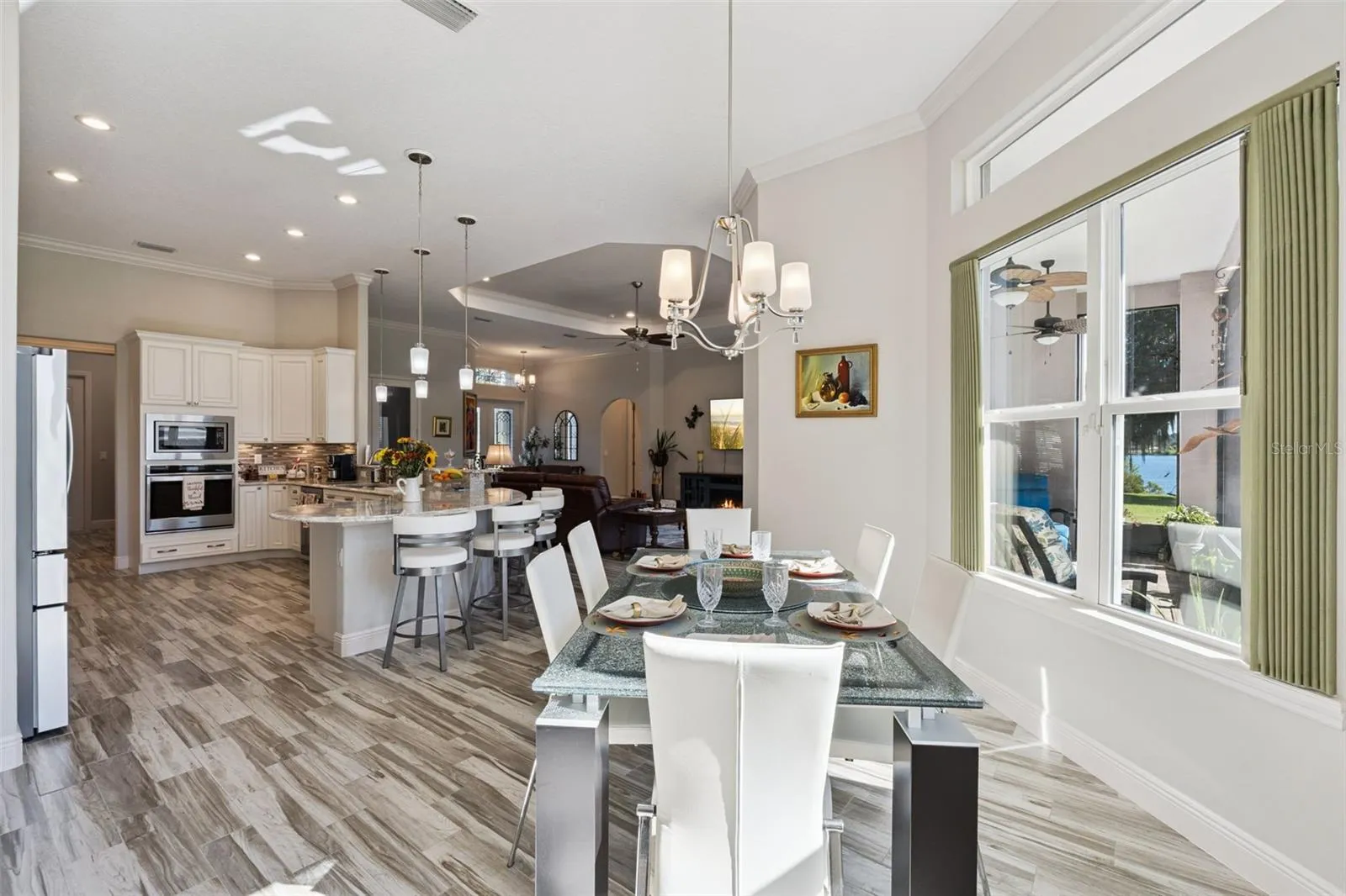 Casual dining area off the kitchen featuring scenic water views.