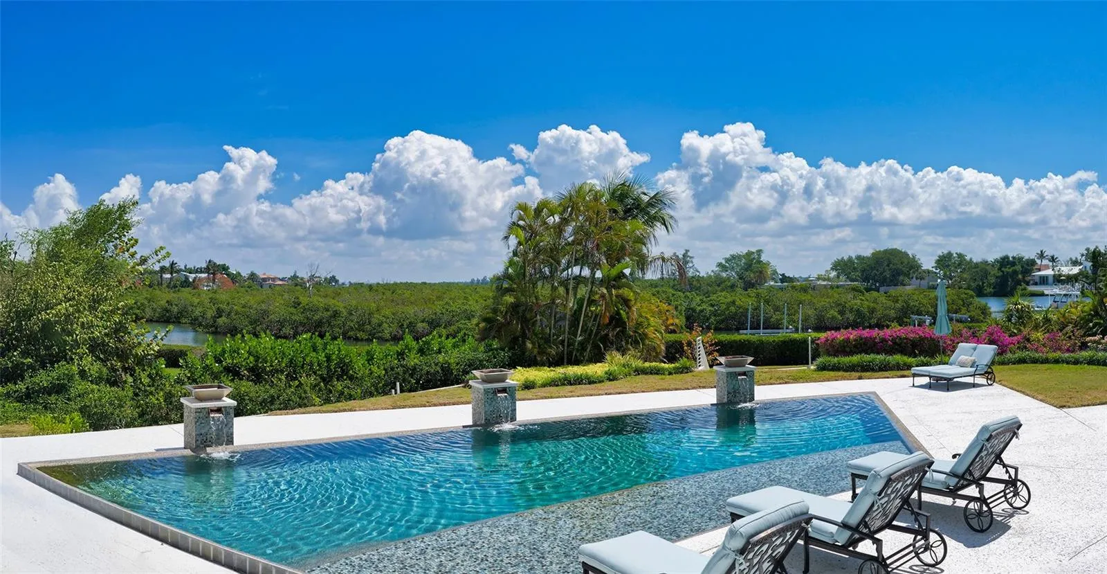 view of the pool and bayou