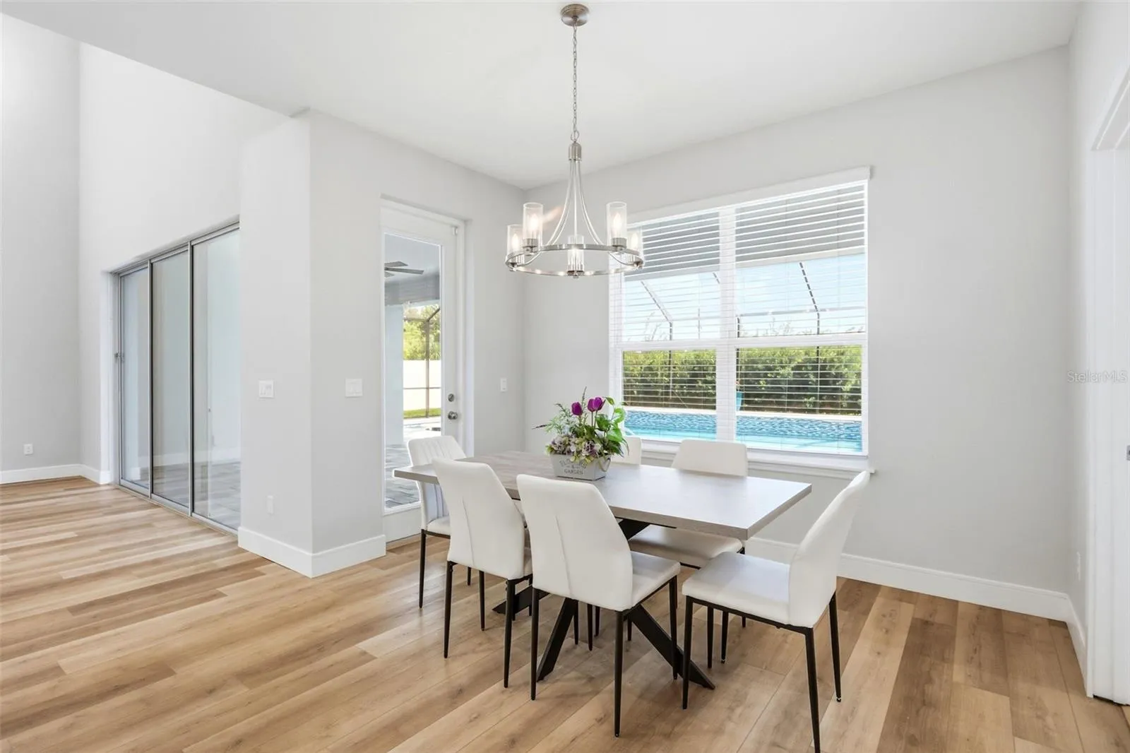Breakfast nook with great view of the pool and door leading out to the lanai