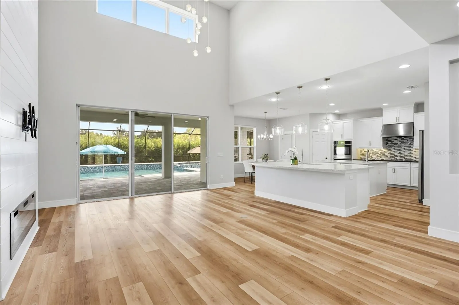 Newer luxury plank vinyl flooring throughout the downstairs