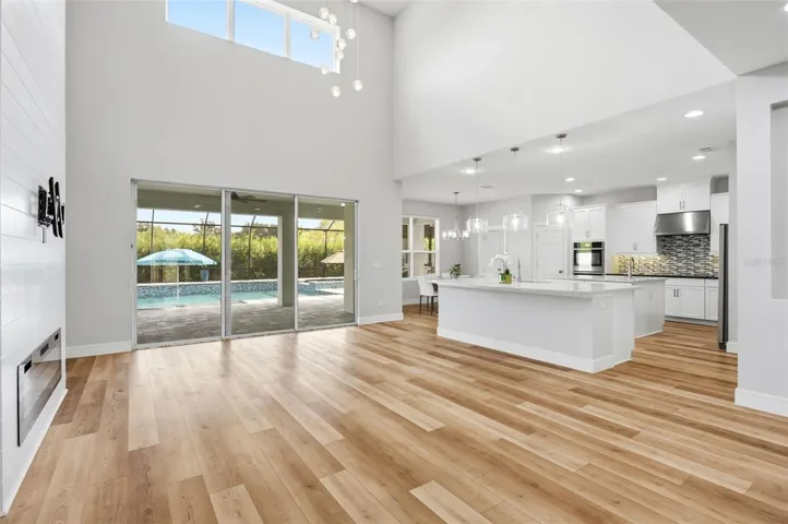 Newer luxury plank vinyl flooring throughout the downstairs