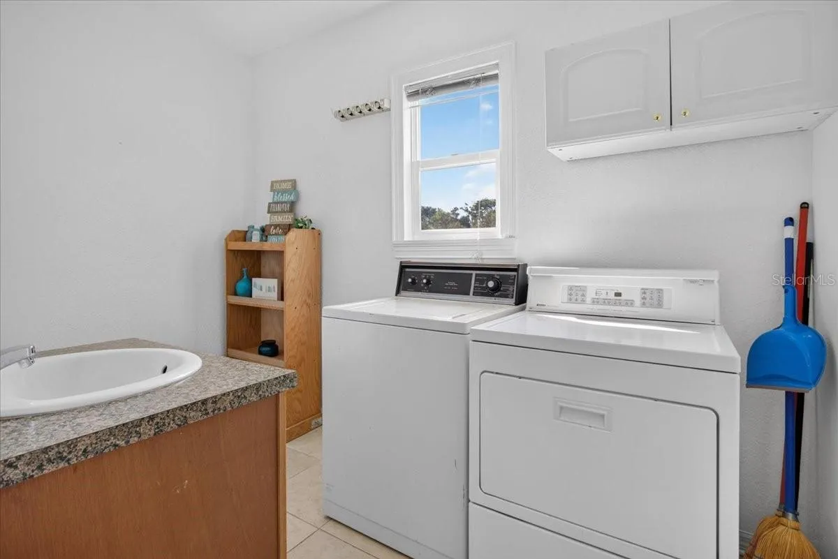 Spacious laundry room with a 1/2 bath!