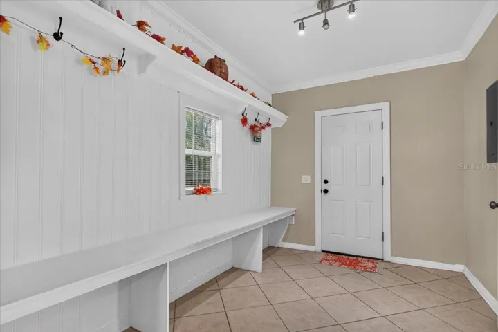 A spacious "mud room" for shoes and whatever you want here!