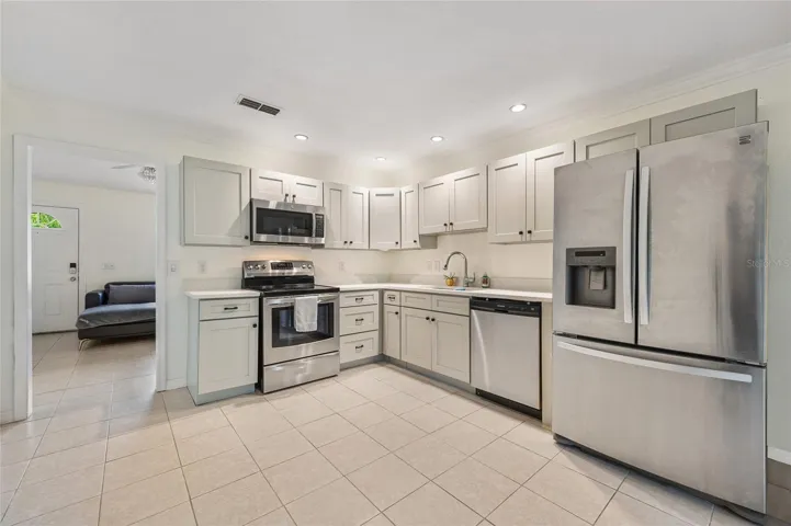 Kitchen area leading to living room.