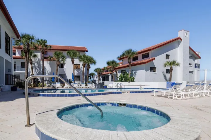 Spa & pool surrounded by spacious deck to relax & enjoy!